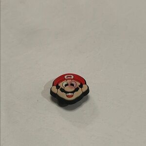 Red and Black Cartoon Character Pin